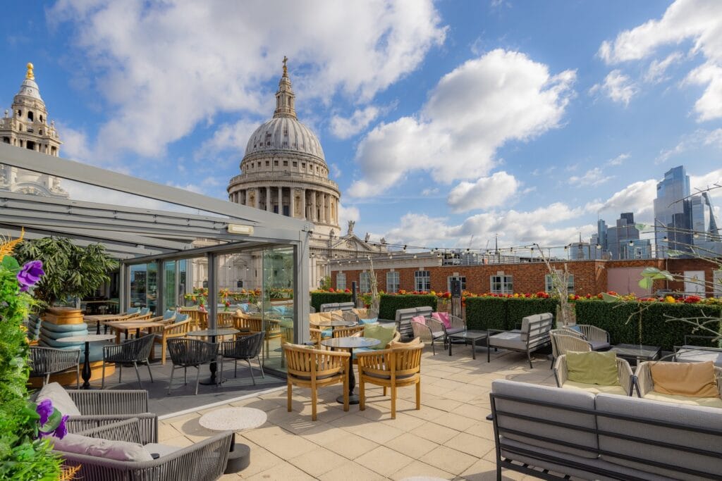 Rooftop bar in London overlooking royal landmarks, curated by the best DMC for UK for modern enjoyment experiences.